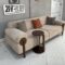 bege 3 seater sofa paired with mahogany wood skirting