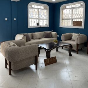 beige 3 seater paired up with patterend accents