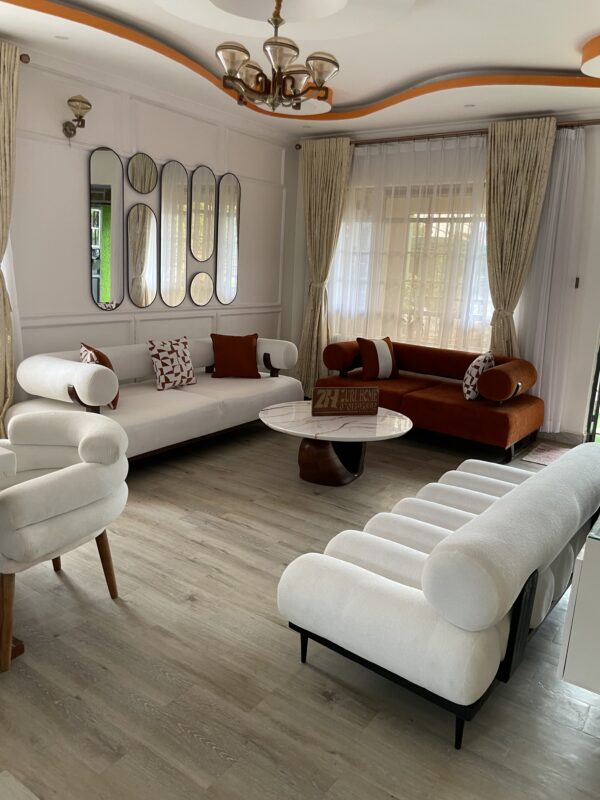 5 seater sofa set paired with a marbe coffee table and bench