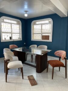 Mahogany dining table with a glass top