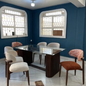 Mahogany dining table with a glass top